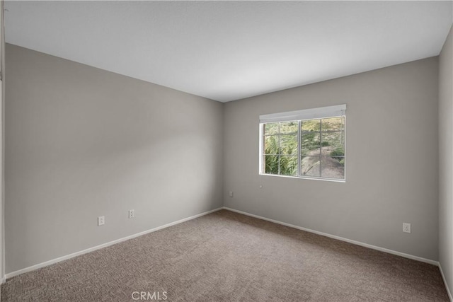19752 Sierra Meadows Ln, Porter Ranch, CA 91326 - carpeted empty room with baseboards
