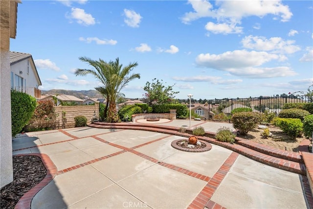 19752 Sierra Meadows Ln, Porter Ranch, CA 91326 - fenced backyard featuring a patio and a fire pit