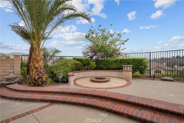 19752 Sierra Meadows Ln, Porter Ranch, CA 91326 - view of patio / terrace with a fire pit