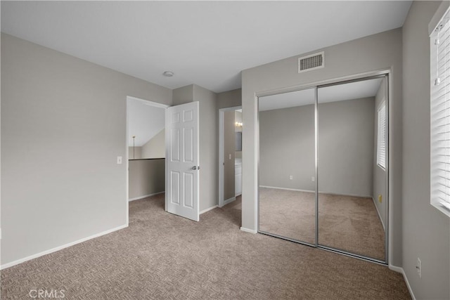 19752 Sierra Meadows Ln, Porter Ranch, CA 91326 - unfurnished bedroom featuring carpet flooring, multiple windows, and a closet