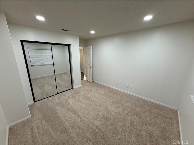 15332 Tuscola Rd, Apple Valley, CA 92307 - unfurnished bedroom featuring carpet floors, recessed lighting, baseboards, and a closet