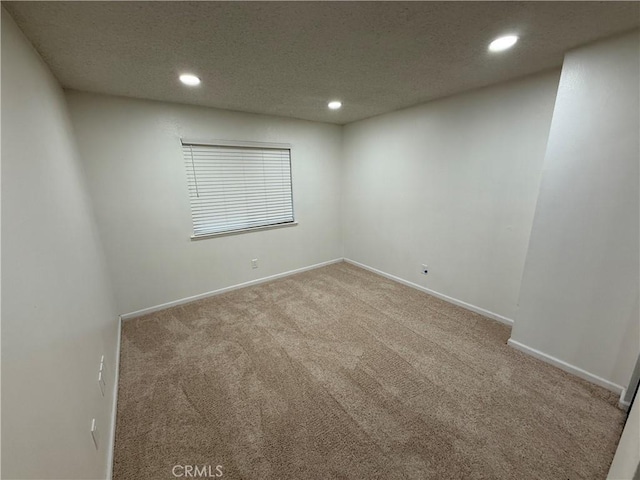 15332 Tuscola Rd, Apple Valley, CA 92307 - carpeted empty room with recessed lighting, baseboards, and a textured ceiling