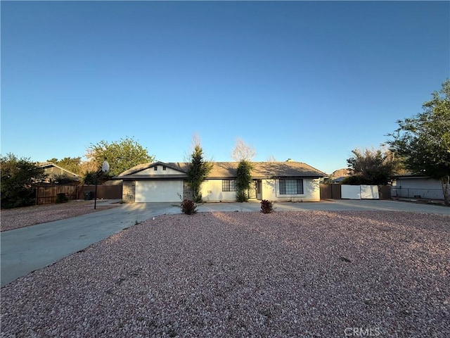 15332 Tuscola Rd, Apple Valley, CA 92307 - single story home with concrete driveway, an attached garage, and stucco siding
