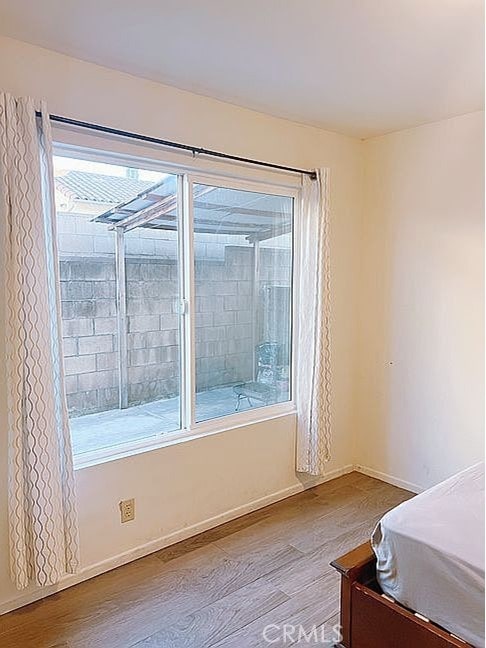 410 Russell Ave Unit C, Monterey Park, CA 91755 - bedroom featuring wood finished floors and baseboards