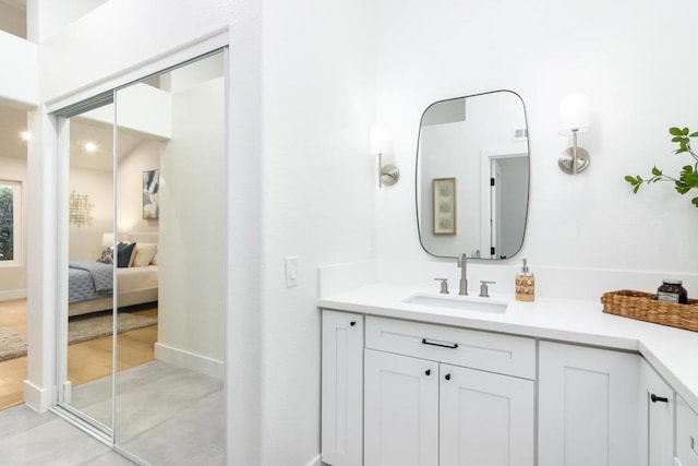 4161 Rhodes Way, Oceanside, CA 92056 - ensuite bathroom featuring vanity and baseboards