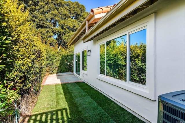 4161 Rhodes Way, Oceanside, CA 92056 - view of green lawn featuring a patio and central AC unit