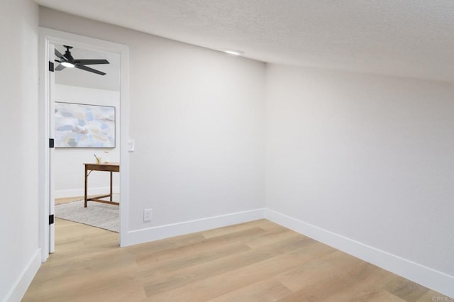 4161 Rhodes Way, Oceanside, CA 92056 - empty room featuring light wood finished floors, baseboards, ceiling fan, and a textured ceiling