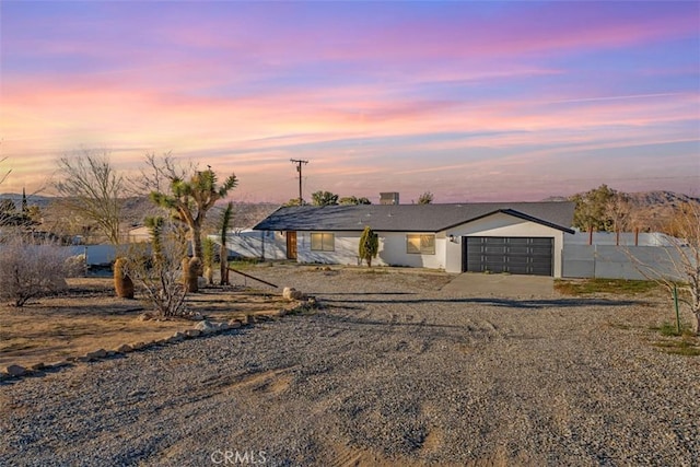 60468 Latham Trl, Joshua Tree, CA 92252 - view of front facade featuring driveway and an attached garage