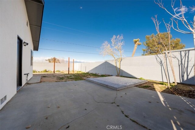 60468 Latham Trl, Joshua Tree, CA 92252 - fenced backyard with a patio