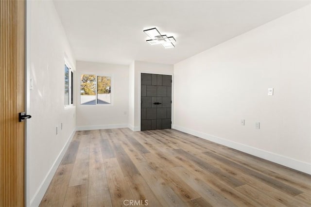 60468 Latham Trl, Joshua Tree, CA 92252 - unfurnished room with light wood-type flooring and baseboards