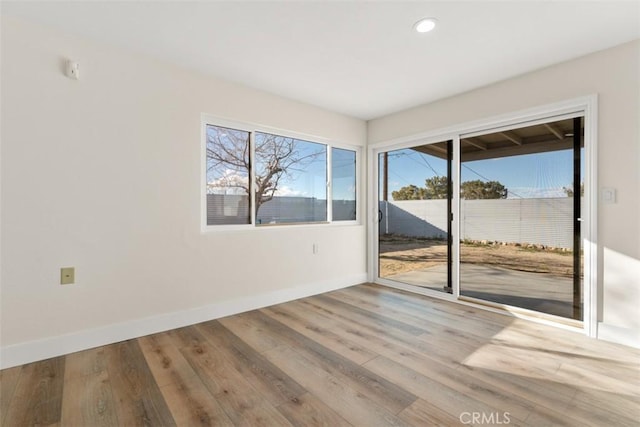 60468 Latham Trl, Joshua Tree, CA 92252 - empty room with baseboards, wood finished floors, and recessed lighting