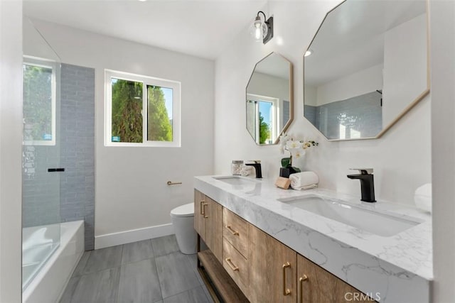 60468 Latham Trl, Joshua Tree, CA 92252 - full bath featuring toilet, double vanity, baseboards, and bathing tub / shower combination