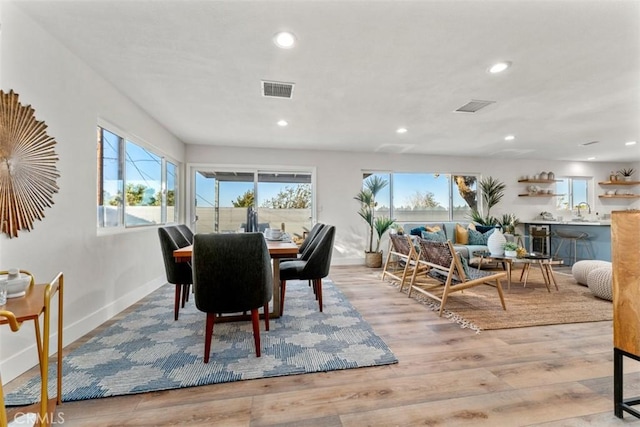 60468 Latham Trl, Joshua Tree, CA 92252 - dining room with healthy amount of natural light, recessed lighting, light wood-style flooring, and baseboards