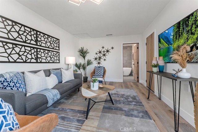 60468 Latham Trl, Joshua Tree, CA 92252 - living room featuring wood finished floors and baseboards