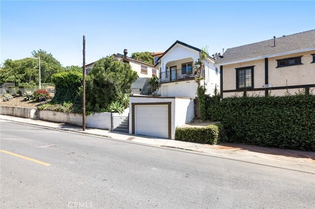 4142 Mercury Ave, Los Angeles, CA 90031 - view of front of property featuring a garage and stucco siding