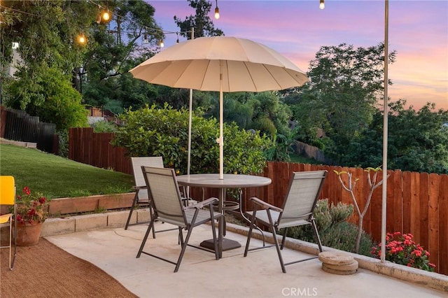 4142 Mercury Ave, Los Angeles, CA 90031 - patio terrace at dusk with a patio area and outdoor dining space