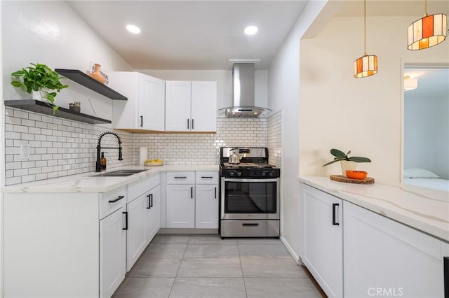 4142 Mercury Ave, Los Angeles, CA 90031 - kitchen with wall chimney exhaust hood, stainless steel gas stove, open shelves, light marble finish floors, and a sink