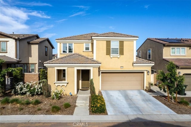 3235 E Olympic Dr, Ontario, CA 91762 - view of front facade featuring a tiled roof and stucco siding