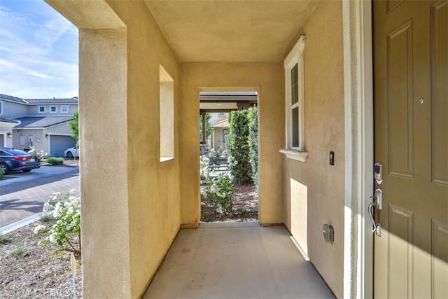 3235 E Olympic Dr, Ontario, CA 91762 - doorway to property with stucco siding