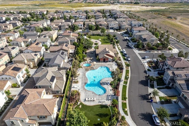 3235 E Olympic Dr, Ontario, CA 91762 - aerial perspective of suburban area featuring a pool area