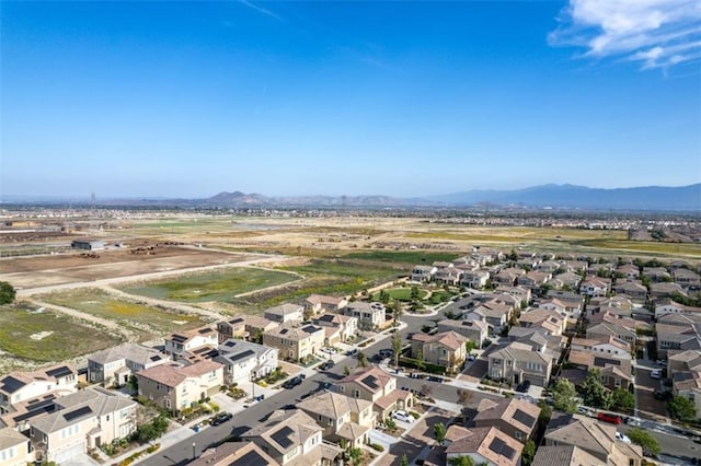 3235 E Olympic Dr, Ontario, CA 91762 - aerial perspective of suburban area with a mountainous background