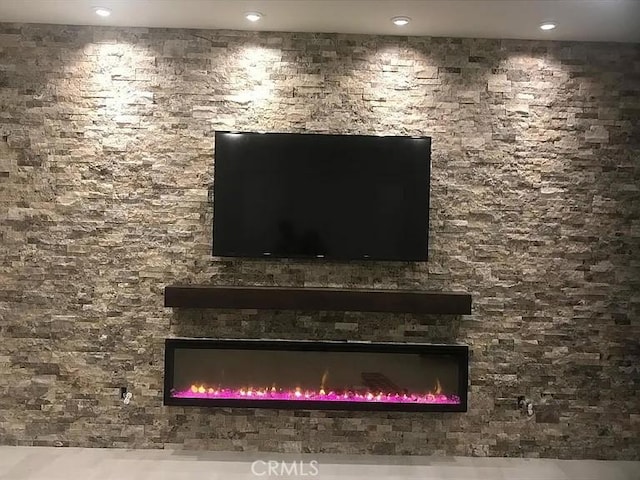 3235 E Olympic Dr, Ontario, CA 91762 - detailed view of recessed lighting and a glass covered fireplace