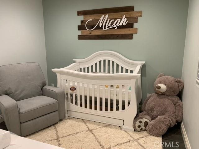 3235 E Olympic Dr, Ontario, CA 91762 - bedroom with a nursery area and baseboards