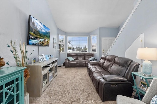 6600 Montresor Pl, Rancho Cucamonga, CA 91737 - carpeted living area featuring vaulted ceiling and stairs