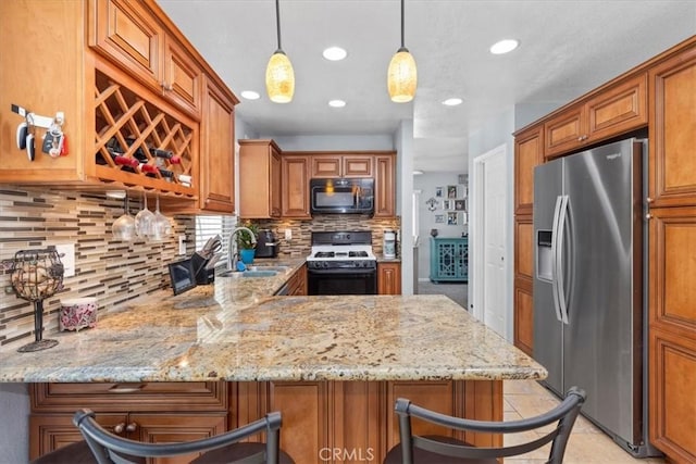 6600 Montresor Pl, Rancho Cucamonga, CA 91737 - kitchen featuring stainless steel fridge, gas range, black microwave, a sink, and decorative backsplash