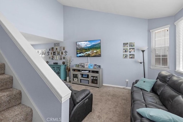 6600 Montresor Pl, Rancho Cucamonga, CA 91737 - living area with carpet flooring, stairway, healthy amount of natural light, and baseboards