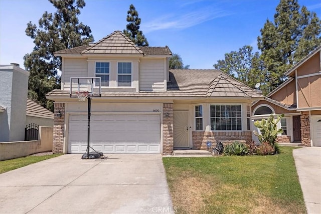 6600 Montresor Pl, Rancho Cucamonga, CA 91737 - view of front of house with brick siding, driveway, and an attached garage