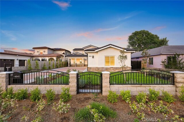 4840 Temple City Blvd, Temple City, CA 91780 - view of front of home featuring stone siding, stucco siding, and a gate