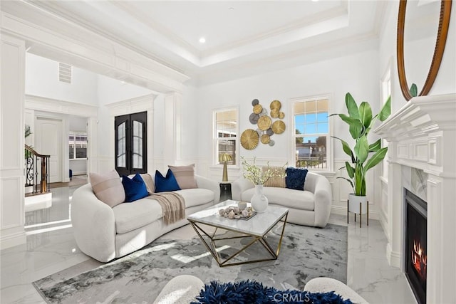 4840 Temple City Blvd, Temple City, CA 91780 - living area featuring a decorative wall, marble tiled floors, a premium fireplace, a high ceiling, and a raised ceiling