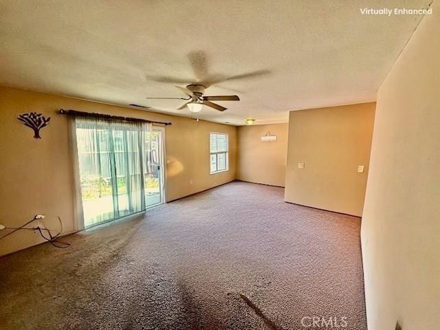 631 N St, Corning, CA 96021 - carpeted spare room featuring ceiling fan and a textured ceiling