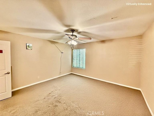 631 N St, Corning, CA 96021 - carpeted empty room with ceiling fan and baseboards
