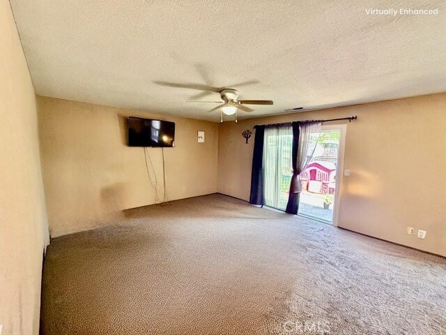 631 N St, Corning, CA 96021 - unfurnished room featuring a ceiling fan, light colored carpet, and a textured ceiling