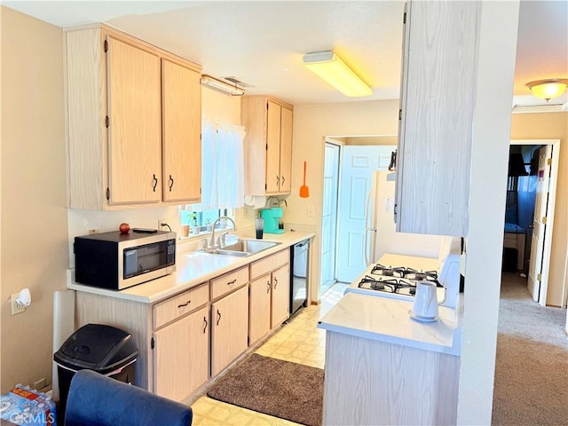631 N St, Corning, CA 96021 - kitchen with a sink, dishwasher, light brown cabinetry, and light countertops