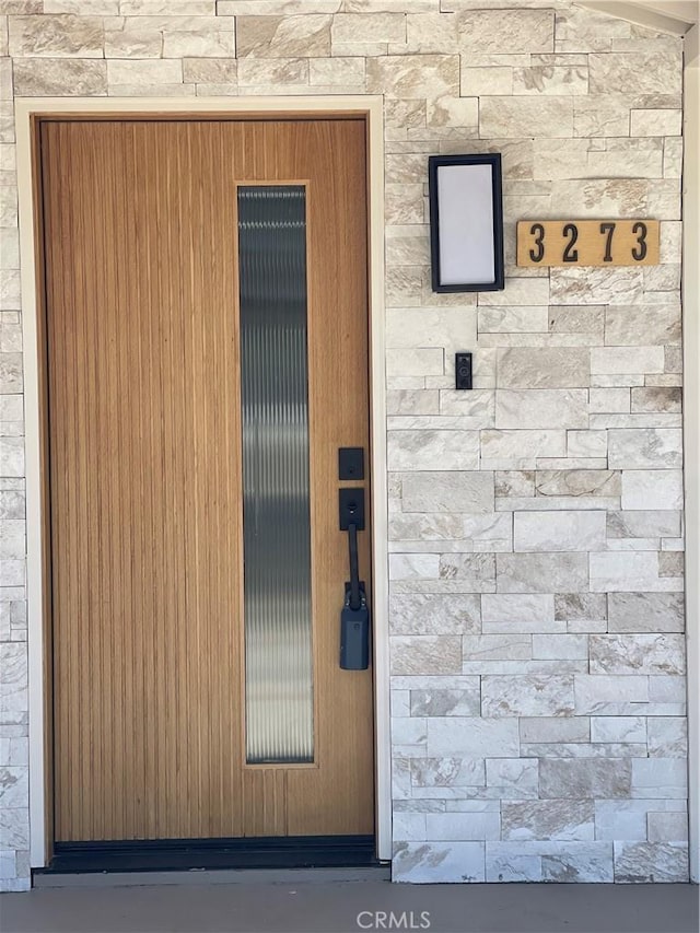 3273 Tilden Ave, Los Angeles, CA 90034 - doorway to property with stone siding
