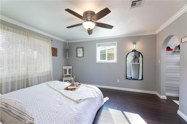 6903 E Driscoll St, Long Beach, CA 90815 - bedroom featuring arched walkways, baseboards, ornamental molding, hardwood / wood-style flooring, and a ceiling fan