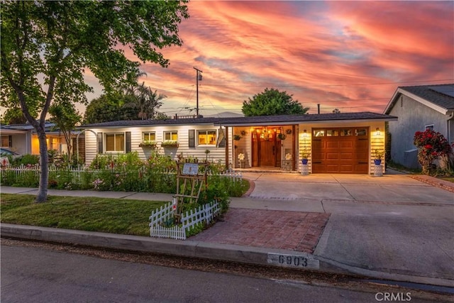 6903 E Driscoll St, Long Beach, CA 90815 - ranch-style house with driveway and a garage