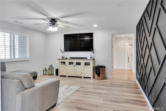 4777 Magnum Way, Jurupa Valley, CA 91752 - living room featuring a ceiling fan, light wood finished floors, baseboards, and recessed lighting