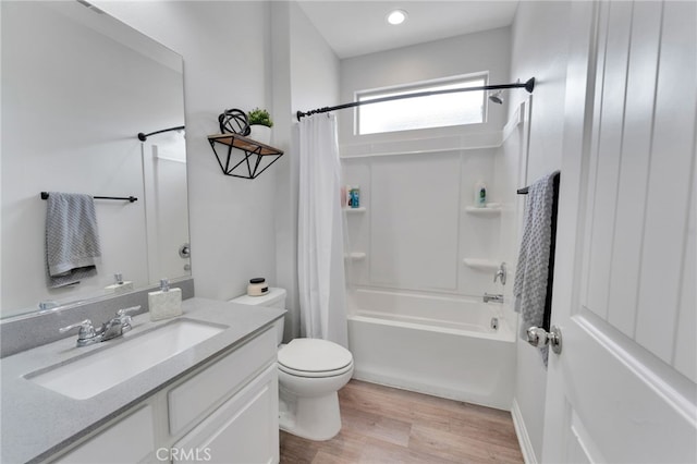 4777 Magnum Way, Jurupa Valley, CA 91752 - full bathroom featuring wood finished floors, toilet, vanity, shower / bath combination with curtain, and recessed lighting