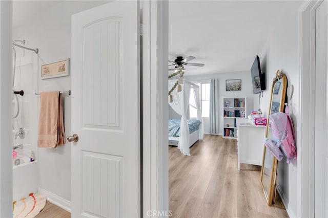 4777 Magnum Way, Jurupa Valley, CA 91752 - corridor featuring light wood-style flooring and baseboards