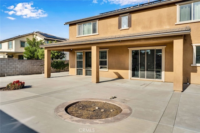 4777 Magnum Way, Jurupa Valley, CA 91752 - back of property featuring stucco siding and a patio
