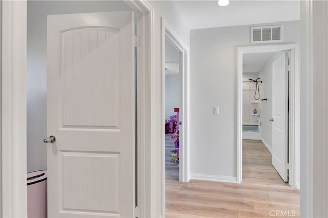 4777 Magnum Way, Jurupa Valley, CA 91752 - corridor featuring light wood-style flooring, baseboards, and recessed lighting