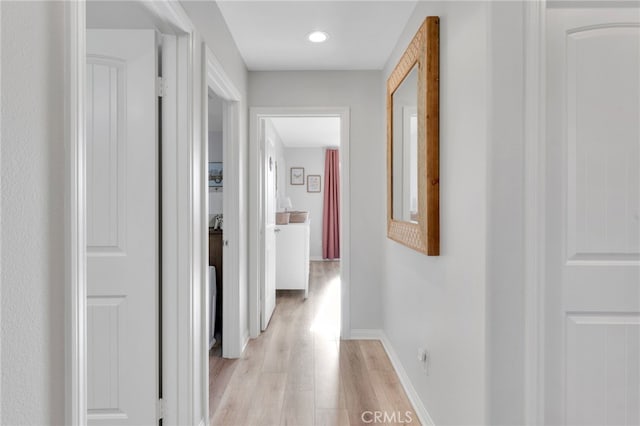 4777 Magnum Way, Jurupa Valley, CA 91752 - hallway with light wood-type flooring, baseboards, and recessed lighting