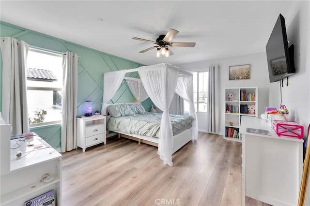 4777 Magnum Way, Jurupa Valley, CA 91752 - bedroom with light wood finished floors and a ceiling fan