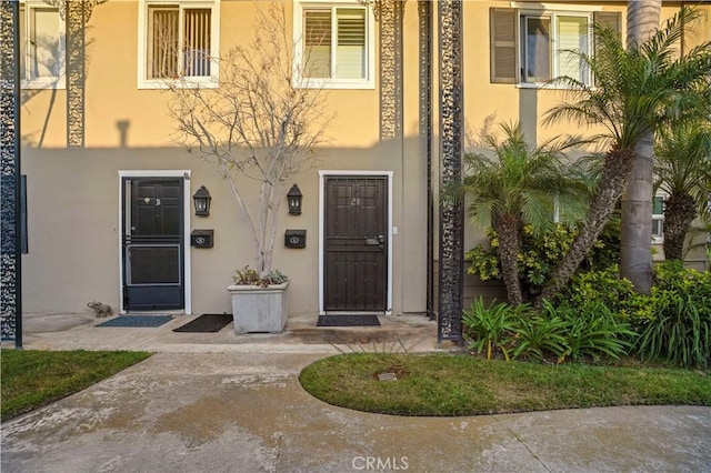 1741 Tustin Ave Unit 5, Costa Mesa, CA 92627 - doorway to property with stucco siding