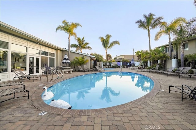 1741 Tustin Ave Unit 5, Costa Mesa, CA 92627 - community pool with french doors and a patio area