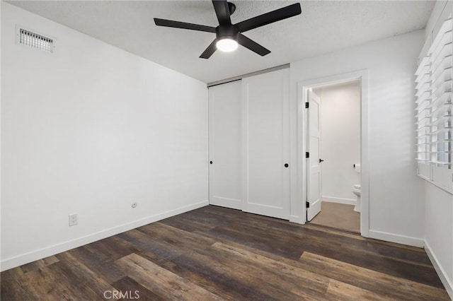 1741 Tustin Ave Unit 2A, Costa Mesa, CA 92627 - unfurnished bedroom featuring dark wood-style flooring, a closet, and ceiling fan
